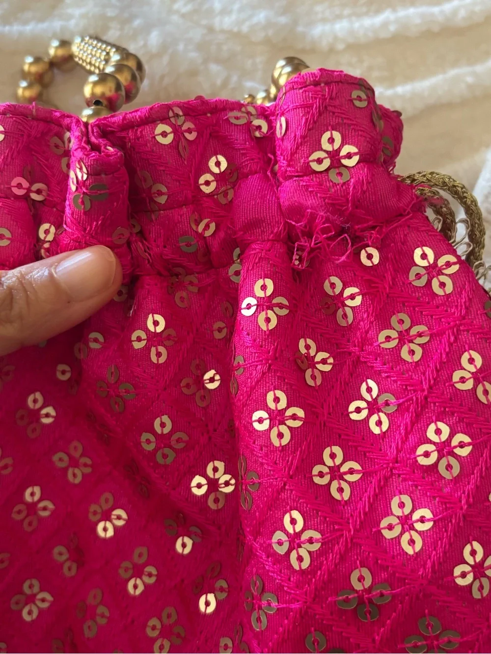 Ethnic Indian Wear Hot Pink Embellished Evening Potli with Gold Tassels